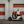 Rider on a white Zero LS1 beside a roller door